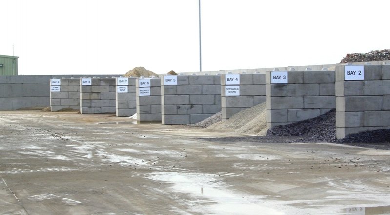 Numbered aggregate storage bays formed from Duo interlocking blocks
