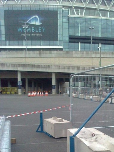 Ballast blocks weighting temporary fencing outside Wembley Stadium