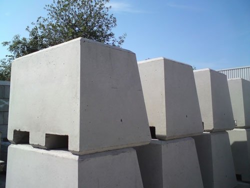 Stacked one-tonne Kentledge ballast blocks with moulded lifting recesses