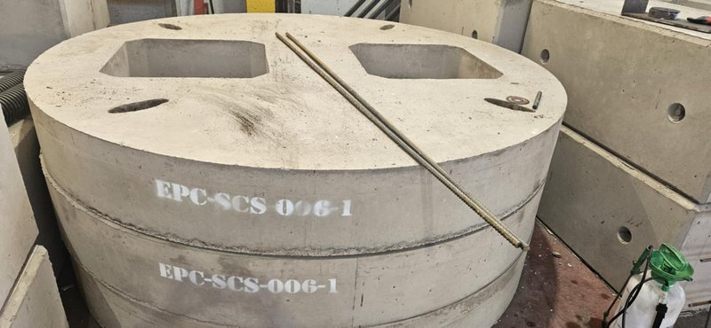 Circular cover slab with two rectangular openings marked EPC-SCS-006-1