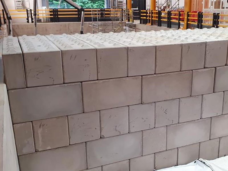 Close view of a Legato interlocking block bunker wall with keyed top course