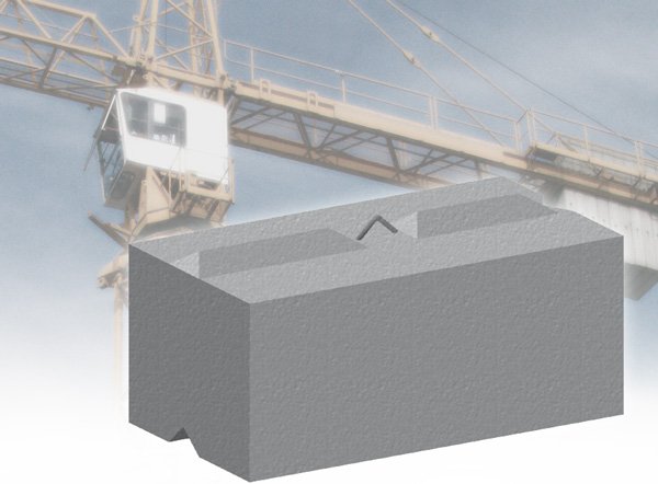 Precast counterweight block with lifting points beneath a crane gantry