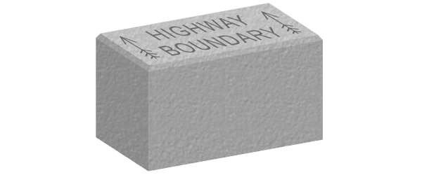 Product view of a marker block cast with Highway Boundary lettering and arrows