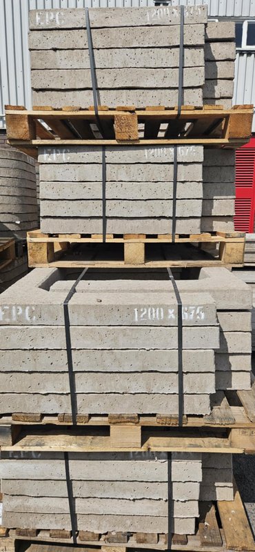 Banded pallets of 1200 x 675 seating rings stacked in the works