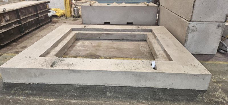 Rectangular bespoke cover slab with a large square opening in the factory