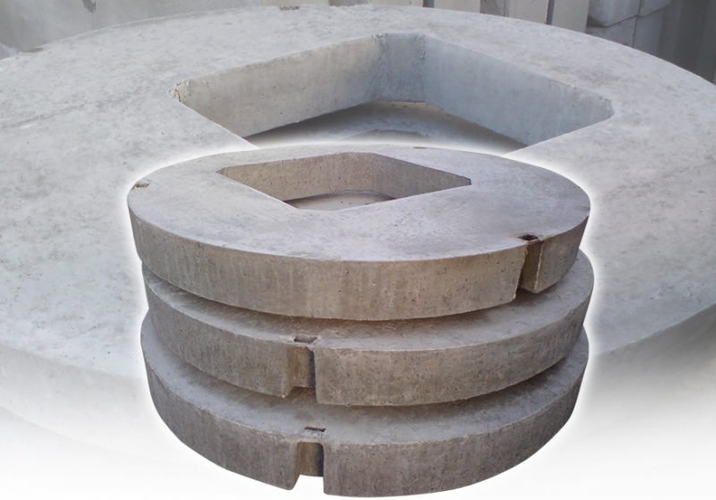 Stacked circular manhole cover slabs with square access openings