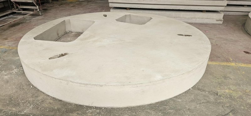 Large circular cover slab with two rectangular access openings