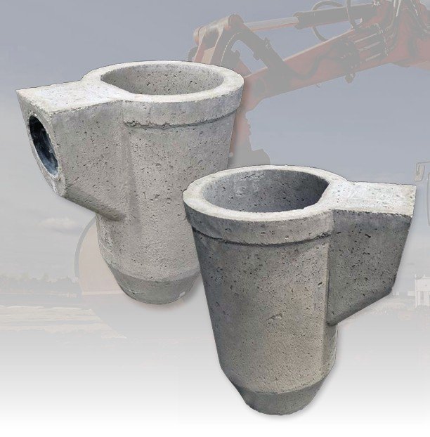 Two precast concrete road gully pots with side inlet openings