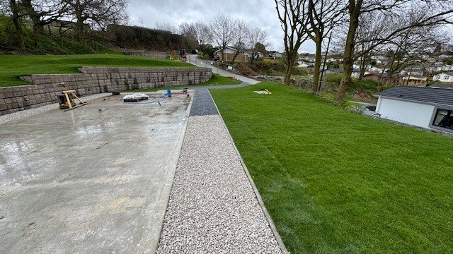 Terraced retaining wall creating level accommodation ground at a holiday park
