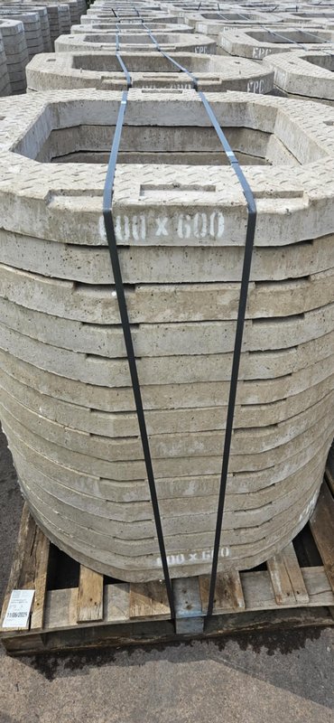 Strapped stack of 600 x 600 adjusting units on a pallet in the yard