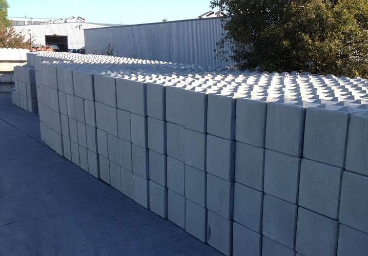 Rows of new Legato interlocking blocks stacked in a production yard