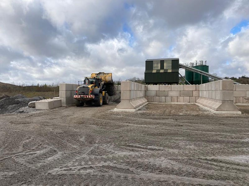 Loading shovel working between Legato block storage bays at a quarry