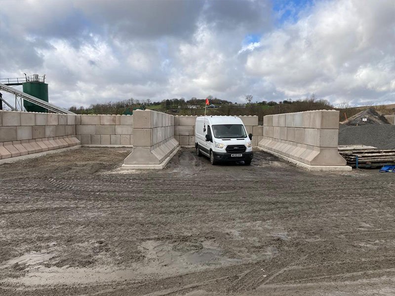 Van parked inside newly built Legato interlocking block storage bays