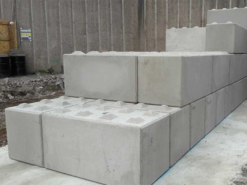 Close-up of stacked Legato interlocking blocks showing their shear key tops