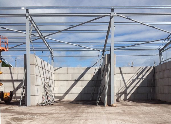 Legato block bay walls installed inside a partially clad steel frame building