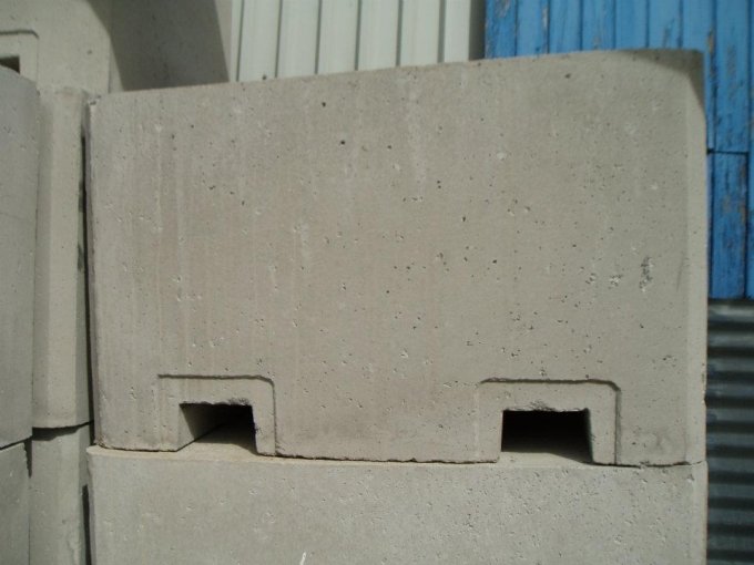 Stacked security blocks showing their forklift handling slots