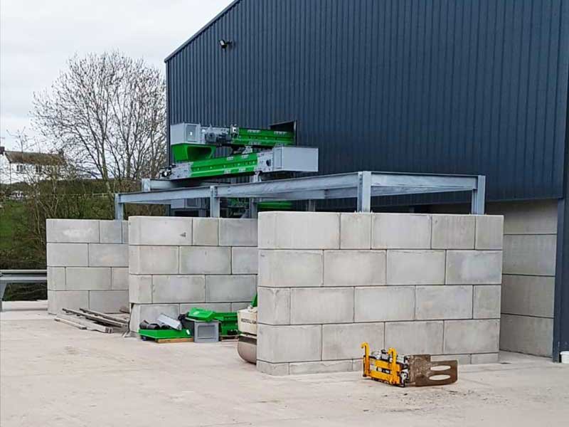 Legato block storage bays built against a blue clad industrial unit