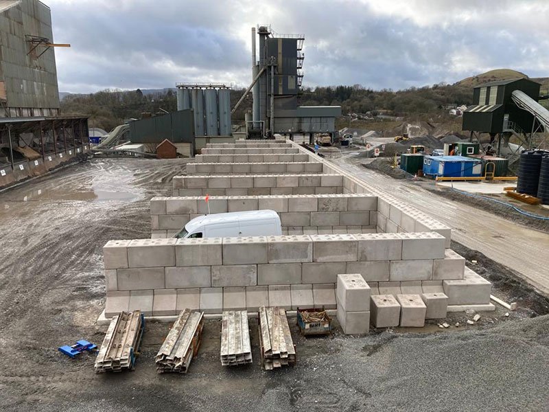 Legato block storage bays under construction beside quarry processing plant