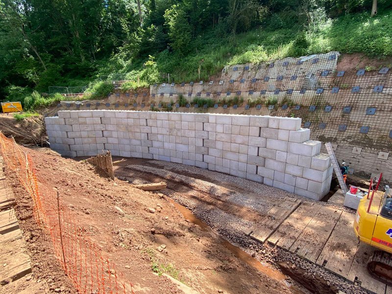 Stepped Legato block walling built into a hillside beside an excavation