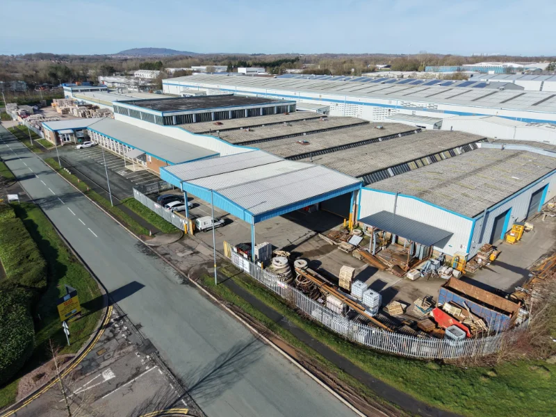 Aerial view of a precast concrete works with warehouses and a stock yard