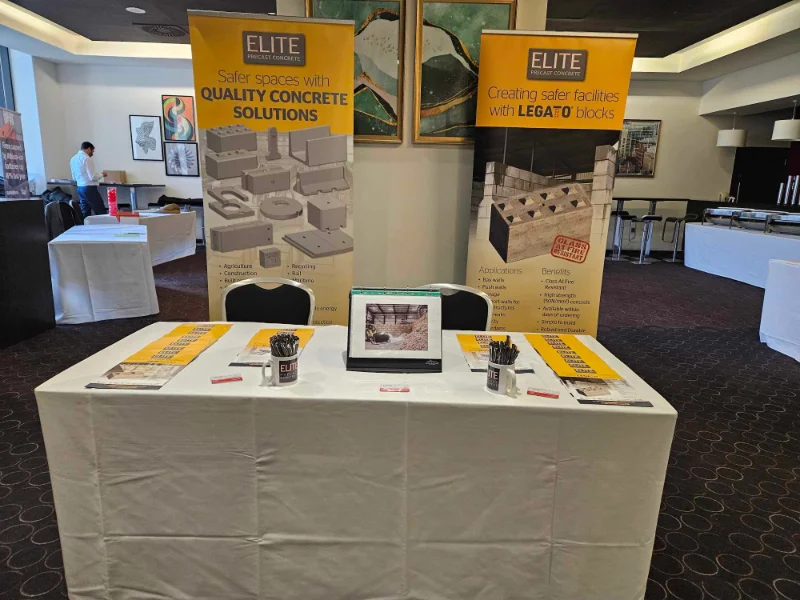 Pull-up banners and a display table promoting Legato interlocking blocks at an event
